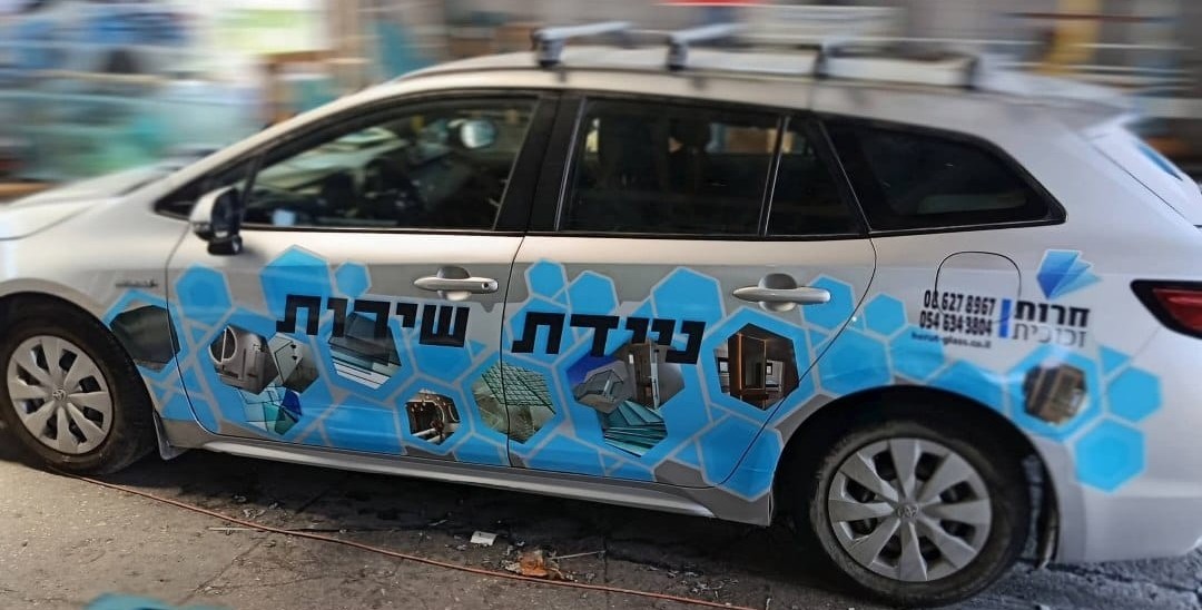 A complete graphic wrap on a passenger car.